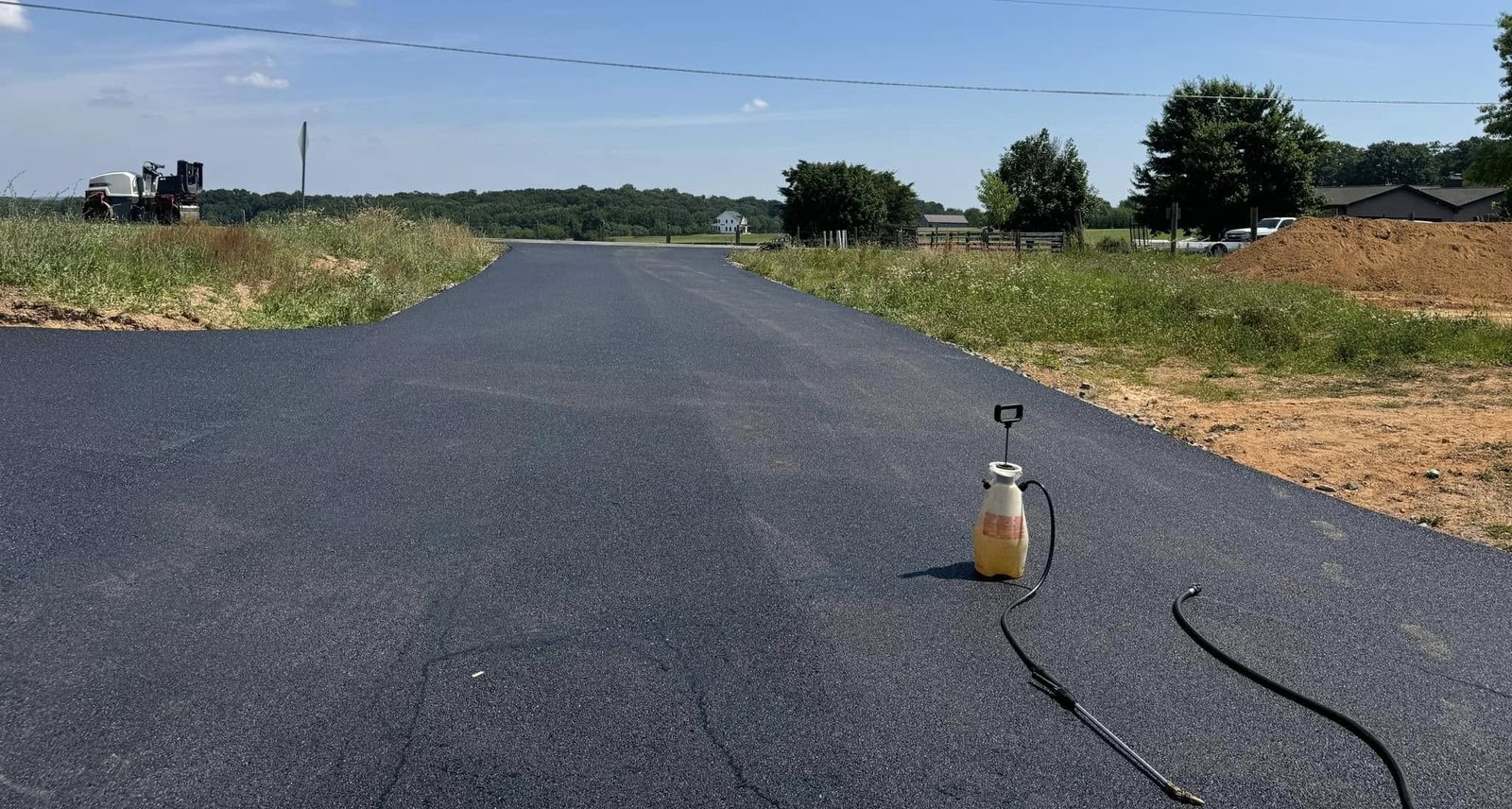 Tar and chip paved surface with stone aggregate by D&H Paving